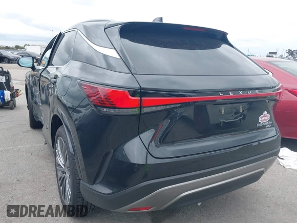 2024 Lexus RX 450h+ Luxury with VIN JTJCJMGA1R2022295, listed as a IAAI auction lot 41778650 with 1,822 mi miles and . Bid and sale history available at DreamBid. Image 3.