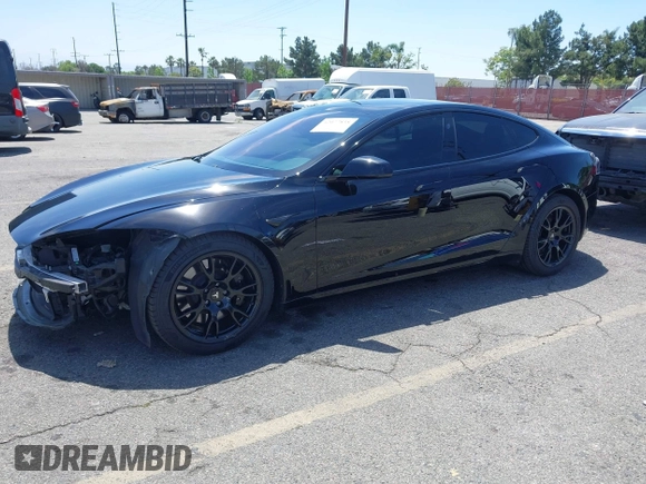 2022 Tesla Model S with VIN 5YJSA1E51NF464231, listed as a IAAI auction lot 42077838 with 53,290 mi miles and . Bid and sale history available at DreamBid. Image 2.