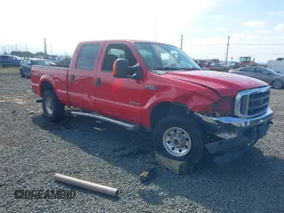 2004 Ford Super Duty F-250 XL with VIN 1FTNW21PX4EB40304, listed as a IAAI auction lot 40306447 with 148,306 mi miles. Bid and sale history available at carsss.com. Image 1.