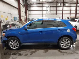 2015 Mitsubishi Outlander SE with VIN 4A4AR4AU1FE054804, listed as a IAAI auction lot 42325699 with 106,680 mi miles and . Bid and sale history available at DreamBid. Image 14.