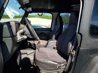 2001 Jeep Wrangler Sport with VIN 1J4FA49S21P339042, listed as a Copart auction lot 56922555 with 113,315 mi miles and Salvage title. Bid and sale history available at DreamBid. Image 7.