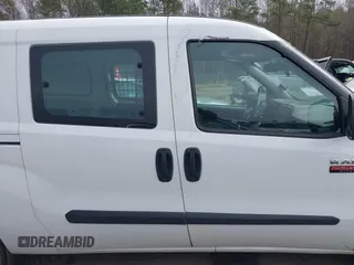2019 Ram ProMaster City Cargo Tradesman z VIN ZFBHRFAB1K6M31770, wystawiony jako IAAI lot #41123546 z przebiegiem 75 517 mil mil oraz . Historia ofert i sprzedaży dostępna na DreamBid. Obrazek 13.