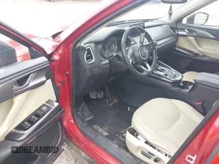 2016 Mazda CX-9 Touring z VIN JM3TCACY0G0101617, wystawiony jako IAAI lot #41850485 z przebiegiem 292 880 mil mil oraz . Historia ofert i sprzedaży dostępna na DreamBid. Obrazek 20.