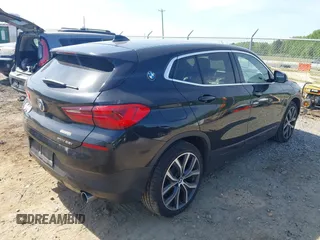 2020 BMW X2 xDrive28i z VIN WBXYJ1C03L5P60659, wystawiony jako IAAI lot #42142386 z przebiegiem 106 914 mil mil oraz . Historia ofert i sprzedaży dostępna na DreamBid. Obrazek 4.