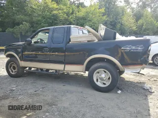 2000 Ford F-150 XL with VIN 1FTRX18L4YNB09146, listed as a Copart auction lot 69866804 with 0 mi miles and Non Repairable. Bid and sale history available at carsss.com. Image 2.