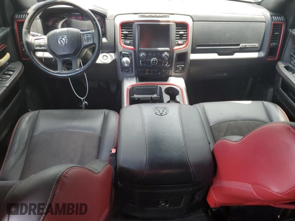 2016 Ram 1500 Rebel z VIN 1C6RR7YT0GS336788, wystawiony jako Copart lot #58507795 z przebiegiem Nie podano mil oraz Szkody całkowita. Historia ofert i sprzedaży dostępna na DreamBid. Obrazek 8.