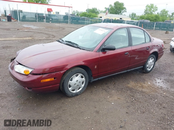 2001 Saturn SL z VIN 1G8ZG52821Z290428, wystawiony jako IAAI lot #42204275 z przebiegiem 171 478 mil mil oraz . Historia ofert i sprzedaży dostępna na DreamBid. Obrazek 2.