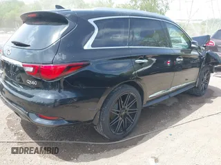 2019 Infiniti QX60 Luxe with VIN 5N1DL0MM3KC534242, listed as a IAAI auction lot 42178116 with 71,290 mi miles and . Bid and sale history available at DreamBid. Image 4.