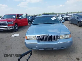 2000 Mercury Grand Marquis LS z VIN 2MEFM75W1YX673105, wystawiony jako IAAI lot #42050980 z przebiegiem 154 944 mil mil oraz . Historia ofert i sprzedaży dostępna na DreamBid. Obrazek 12.