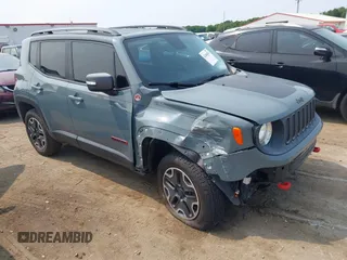 2015 Jeep Renegade Trailhawk z VIN ZACCJBCT0FPC01671, wystawiony jako IAAI lot #42406869 z przebiegiem Nie podano mil oraz . Historia ofert i sprzedaży dostępna na DreamBid. Obrazek 1.