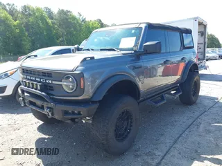2022 Ford Bronco with VIN 1FMDE5BH9NLB87372, listed as a IAAI auction lot 42178135 with 71,585 mi miles and . Bid and sale history available at DreamBid. Image 2.
