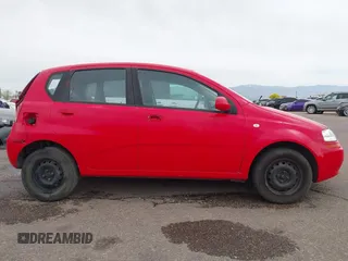 2006 Chevrolet Aveo LS with VIN KL1TD66696B652250, listed as a IAAI auction lot 42015003 with 143,336 mi miles and . Bid and sale history available at DreamBid. Image 14.