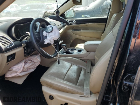 2021 Jeep Grand Cherokee Limited z VIN 1C4RJFBG4MC543292, wystawiony jako Copart lot #58719495 z przebiegiem Nie podano mil oraz Szkoda całkowita • Salvage title. Historia ofert i sprzedaży dostępna na DreamBid. Obrazek 7.