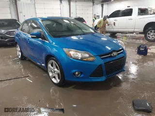 2012 Ford Focus Titanium with VIN 1FAHP3J22CL329842, listed as a IAAI auction lot 41614372 with 215,307 mi miles. Bid and sale history available at carsss.com. Image 1.