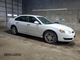2015 Chevrolet Impala LTZ with VIN 2G1WC5E34F1153228, listed as a Copart auction lot 53814275 with 147,773 mi miles and Salvage Title. Bid and sale history available at DreamBid. Image 4.