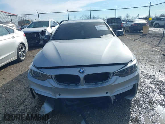 2018 BMW 4 Series 430i with VIN WBA4J1C56JBG80262, listed as a IAAI auction lot 41451833 with 148,487 mi miles and . Bid and sale history available at carsss.com. Image 13.