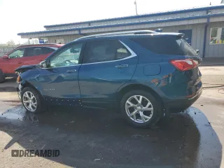 2021 Chevrolet Equinox Premier z VIN 2GNAXXEV9M6115343, wystawiony jako Copart lot #56357955 z przebiegiem 75 439 mil mil oraz Szkoda całkowita • Salvage title. Historia ofert i sprzedaży dostępna na DreamBid. Obrazek 2.