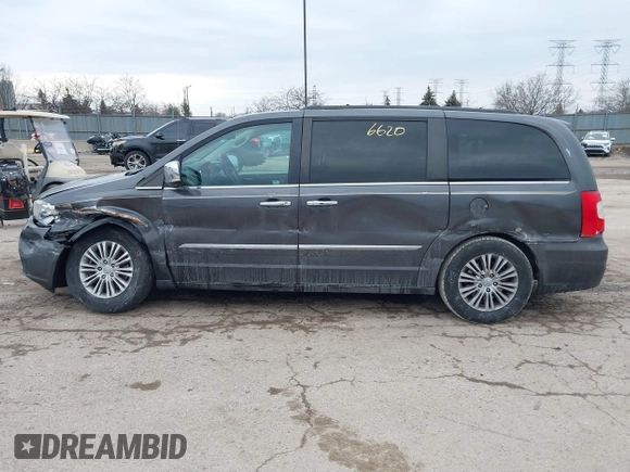 2015 Chrysler Town & Country Touring-L with VIN 2C4RC1CG4FR525588, listed as a IAAI auction lot 41696620 with 225,297 mi miles. Bid and sale history available at carsss.com. Image 14.