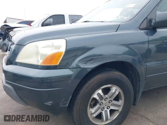 2005 Honda Pilot EX-L with VIN 5FNYF18565B046464, listed as a IAAI auction lot 41879495 with 228,021 mi miles. Bid and sale history available at carsss.com. Image 20.