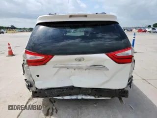 2015 Toyota Sienna XLE with VIN 5TDYK3DC4FS617099, listed as a Copart auction lot 61128025 with 114,508 mi miles and Salvage title. Bid and sale history available at DreamBid. Image 6.
