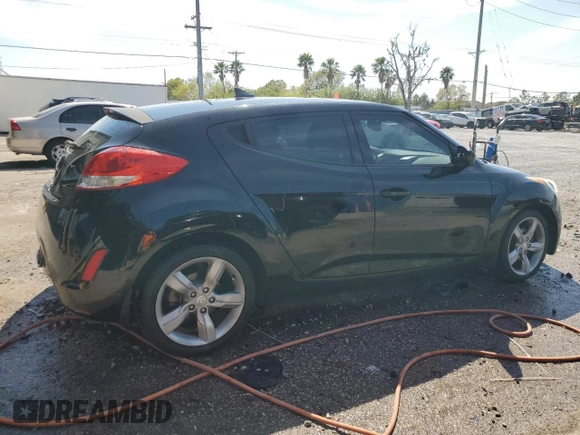 2014 Hyundai Veloster with VIN KMHTC6AD0EU207850, listed as a Copart auction lot 46986695 with 138,024 mi miles and Salvage Title. Bid and sale history available at carsss.com. Image 3.