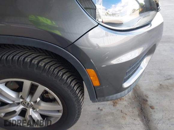 2012 Volkswagen Tiguan SEL with VIN WVGAV7AX1CW004744, listed as a IAAI auction lot 41924952 with 100,964 mi miles and . Bid and sale history available at DreamBid. Image 14.