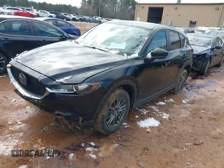 2020 Mazda CX-5 Touring z VIN JM3KFBCMXL1741182, wystawiony jako IAAI lot #41602315 z przebiegiem 31 582 mil mil oraz . Historia ofert i sprzedaży dostępna na DreamBid. Obrazek 2.