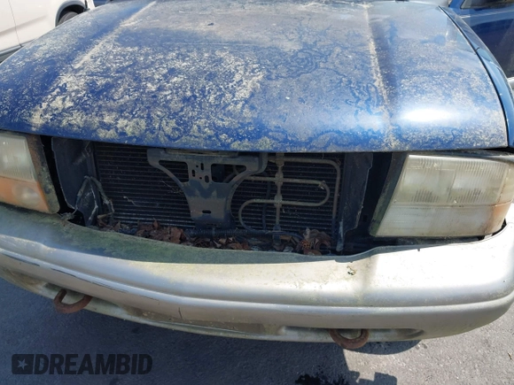 2001 GMC Jimmy SLE z VIN 1GKDT13W612136433, wystawiony jako IAAI lot #42336277 z przebiegiem Nie podano mil oraz . Historia ofert i sprzedaży dostępna na DreamBid. Obrazek 10.