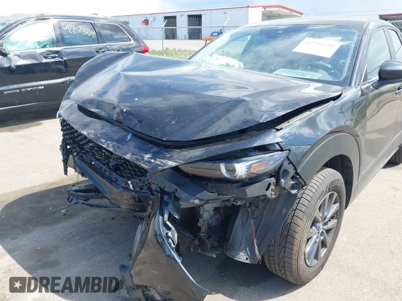 2021 Mazda CX-30 S with VIN 3MVDMBAL0MM254030, listed as a IAAI auction lot 42261180 with 72,459 mi miles and . Bid and sale history available at DreamBid. Image 6.