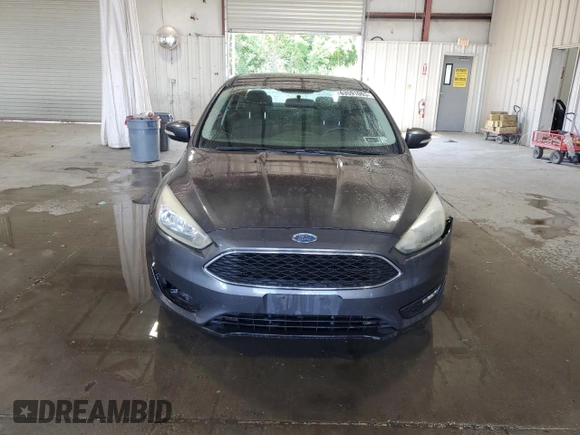 2015 Ford Focus SE with VIN 1FADP3F29FL310622, listed as a Copart auction lot 63591065 with 119,957 mi miles and Salvage title. Bid and sale history available at DreamBid. Image 5.