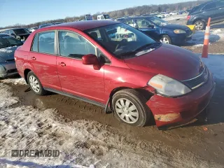 2009 Nissan Versa 1.8 S with VIN 3N1BC11E39L400203, listed as a Copart auction lot 88673145 with 105,578 mi miles and Salvage Title. Bid and sale history available at carsss.com. Image 4.
