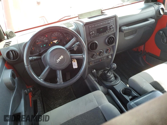 2008 Jeep Wrangler Unlimited X с VIN 1J4GA39138L611878, выставлен на аукционе Copart как лот 54682225 с пробегом 113 214 миль миль и Списание • Salvage title. История ставок и продаж доступна на DreamBid. Изображение 8.
