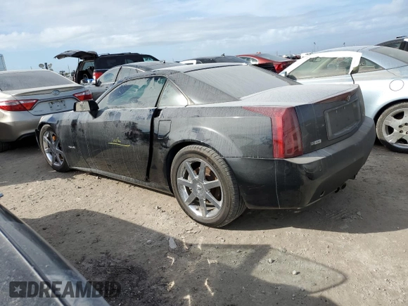2006 Cadillac XLR z VIN 1G6YV36A965600309, wystawiony jako Copart lot #73937584 z przebiegiem Nie podano mil oraz Szkoda całkowita • Salvage title. Historia ofert i sprzedaży dostępna na DreamBid. Obrazek 2.
