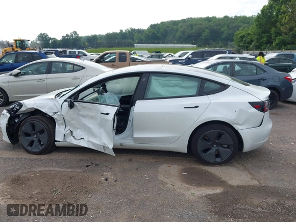 2023 Tesla Model 3 with VIN 5YJ3E1EA4PF644621, listed as a IAAI auction lot 42280312 with 41,262 mi miles and . Bid and sale history available at DreamBid. Image 14.