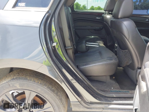 2015 Cadillac SRX Performance Collection with VIN 3GYFNCE31FS605298, listed as a IAAI auction lot 42859993 with 99,192 mi miles and . Bid and sale history available at DreamBid. Image 8.