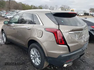 2023 Cadillac XT5 FWD Luxury z VIN 1GYKNAR45PZ140440, wystawiony jako IAAI lot #41723317 z przebiegiem 25 124 mil mil oraz . Historia ofert i sprzedaży dostępna na DreamBid. Obrazek 6.