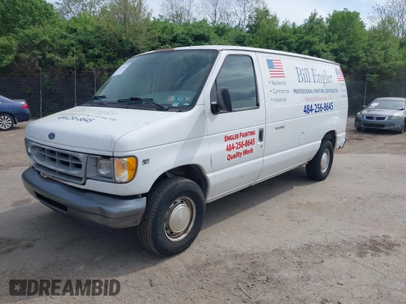 2000 Ford Econoline Cargo with VIN 1FTRE14W1YHB19251, listed as a IAAI auction lot 42114841 with 164,139 mi miles. Bid and sale history available at carsss.com. Image 2.