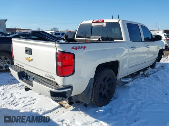 2014 Chevrolet Silverado 1500 High Country with VIN 3GCUKTEC1EG529203, listed as a IAAI auction lot 41643824 with 153,176 mi miles and . Bid and sale history available at DreamBid. Image 4.