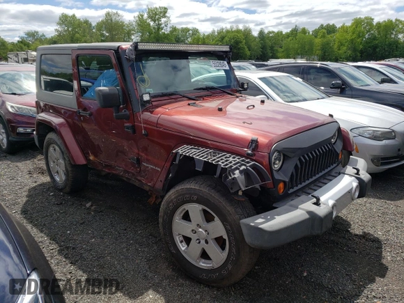 2008 Jeep Wrangler Sahara z VIN 1J4FA54198L505014, wystawiony jako Copart lot #55328045 z przebiegiem 128 049 mil mil oraz Szkoda całkowita • Salvage title. Historia ofert i sprzedaży dostępna na DreamBid. Obrazek 4.