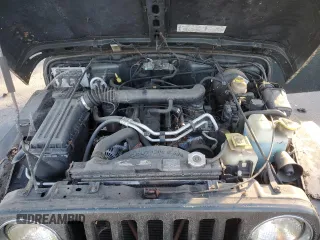 2002 Jeep Wrangler Sahara z VIN 1J4FA59S12P757177, wystawiony jako Copart lot #42808925 z przebiegiem 71 049 mil mil oraz Czysty tytuł • Clean title. Historia ofert i sprzedaży dostępna na DreamBid. Obrazek 11.