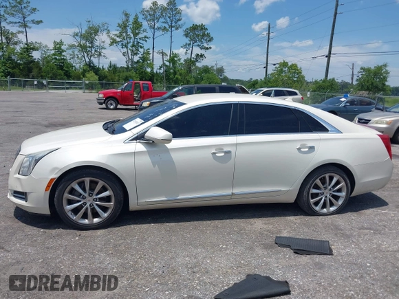 2013 Cadillac XTS Luxury with VIN 2G61P5S38D9160016, listed as a IAAI auction lot 42192602 with 134,879 mi miles and . Bid and sale history available at DreamBid. Image 14.