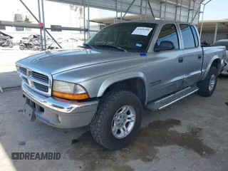 2002 Dodge Dakota SLT with VIN 1B7HG48N62S546119, listed as a IAAI auction lot 41826998 with 157,761 mi miles. Bid and sale history available at carsss.com. Image 17.