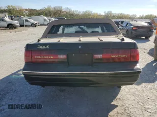1991 Mercury Cougar z VIN 1MEPM60T2MH600363, wystawiony jako Copart lot #76543714 z przebiegiem 169 767 mil mil oraz Szkoda całkowita • Salvage title. Historia ofert i sprzedaży dostępna na DreamBid. Obrazek 6.
