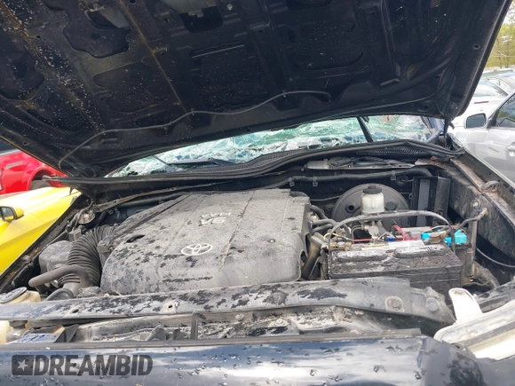 2014 Toyota Tacoma PreRunner z VIN 5TFJU4GN8EX057773, wystawiony jako IAAI lot #42020511 z przebiegiem 228 730 mil mil oraz . Historia ofert i sprzedaży dostępna na DreamBid. Obrazek 10.