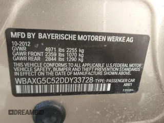 2013 BMW 5 Series 528i with VIN WBAXG5C52DDY33728, listed as a IAAI auction lot 41713841 with 105,963 mi miles and . Bid and sale history available at carsss.com. Image 9.