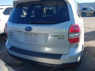 2014 Subaru Forester XT Touring with VIN JF2SJGPC9EH417920, listed as a IAAI auction lot 41270689 with 184,976 mi miles and . Bid and sale history available at DreamBid. Image 16.