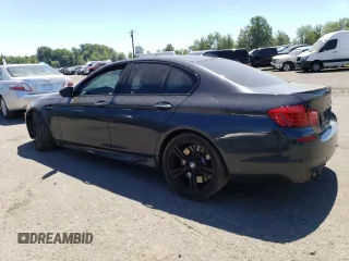 2013 BMW M5 z VIN WBSFV9C50DC774172, wystawiony jako Copart lot #61990854 z przebiegiem Nie podano mil oraz Szkoda całkowita • Salvage title. Historia ofert i sprzedaży dostępna na DreamBid. Obrazek 2.