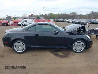 2002 Lexus SC 430 z VIN JTHFN48Y920032217, wystawiony jako IAAI lot #42091287 z przebiegiem 62 093 mil mil oraz . Historia ofert i sprzedaży dostępna na DreamBid. Obrazek 13.