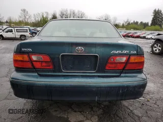1998 Toyota Avalon XL with VIN 4T1BF18B6WU242906, listed as a Copart auction lot 52385935 with 108,802 mi miles and Salvage Title. Bid and sale history available at DreamBid. Image 6.