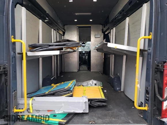 2021 Ford Transit Cargo z VIN 1FTBR3X86MKA46048, wystawiony jako Copart lot #54278795 z przebiegiem 49 593 mil mil oraz Szkoda całkowita • Salvage title. Historia ofert i sprzedaży dostępna na DreamBid. Obrazek 10.